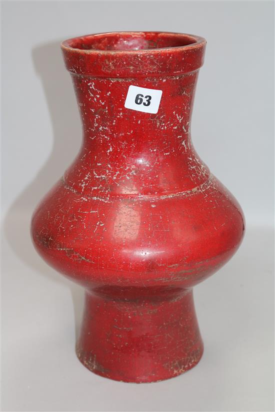 An Oriental red glazed pottery vase height 34cm